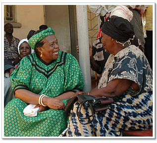 Ambassador Mbikusita-Lewanika chatting with ladies in Zambia's Western Province.