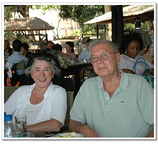 Chairman, Virginia Austin Schubert, and her husband, Founding Board Member, Richard Schubert, taking a lunch break, while on safari in Livingstone. 